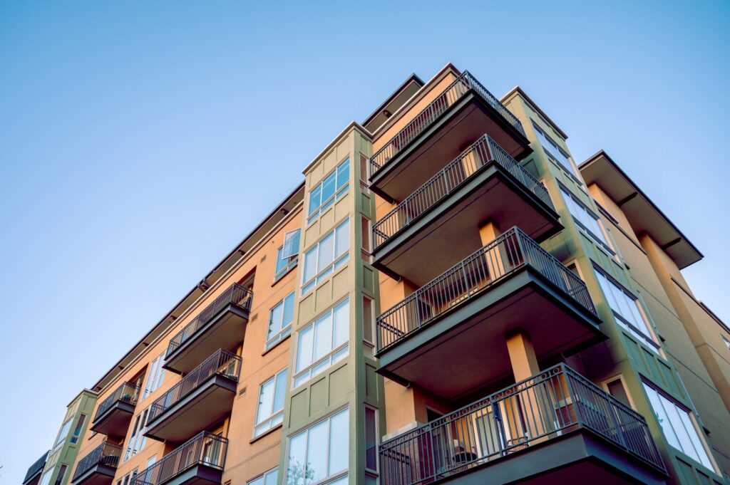 brown apartment building with balconies