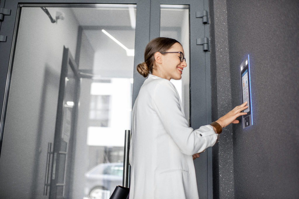 woman gaining access to building using mvi keycom