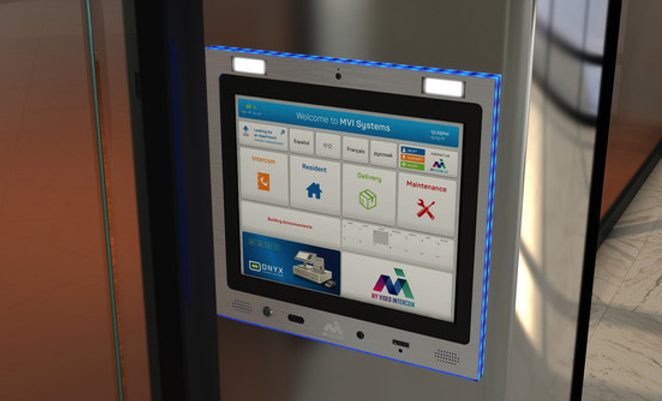 mvi keycom system mounted on metal wall by entrance to building