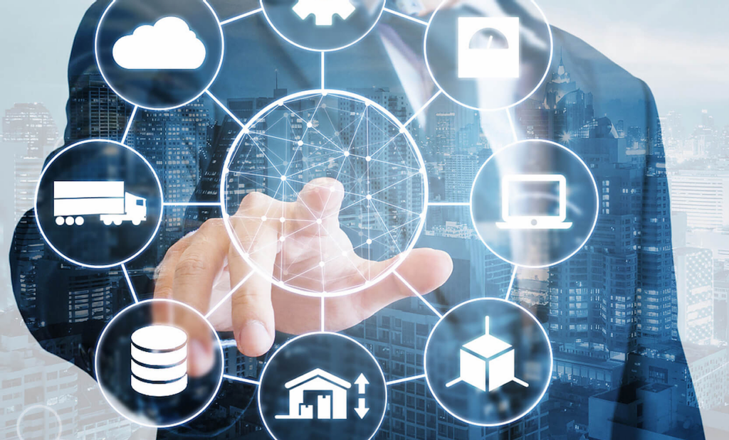 man in suit with city in background selecting from range of innovative technology