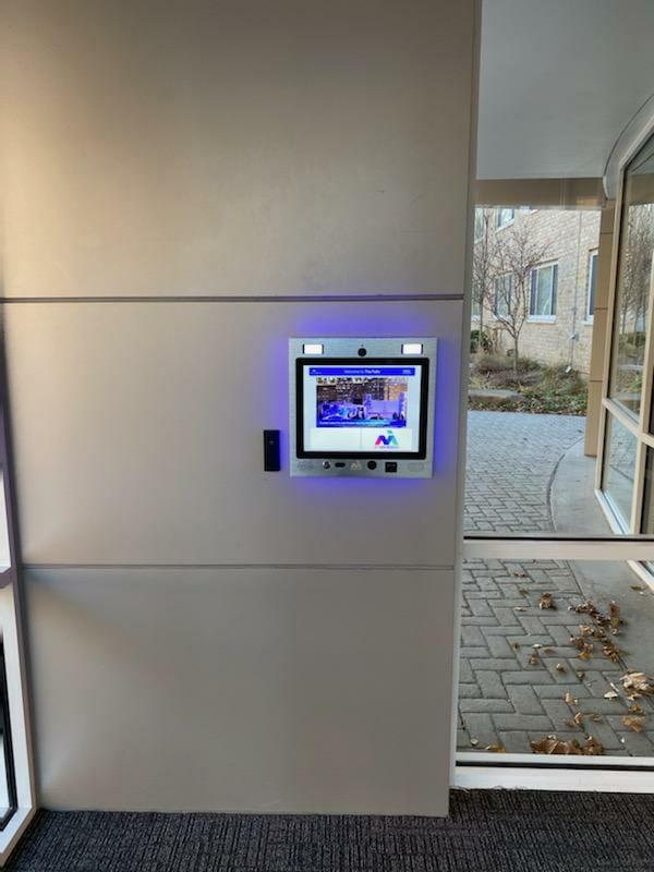 mvi keycom mounted on wall by building entrance