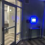 mvi keycom mounted on wall by entrance to apartment building