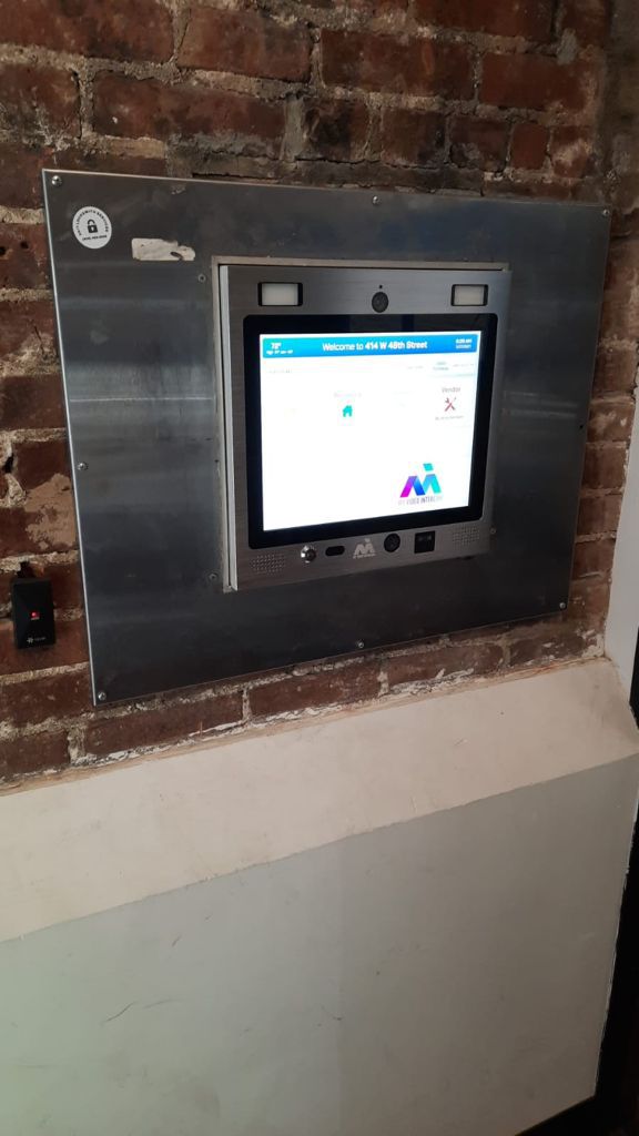 mvi keycom mounted brick on wall