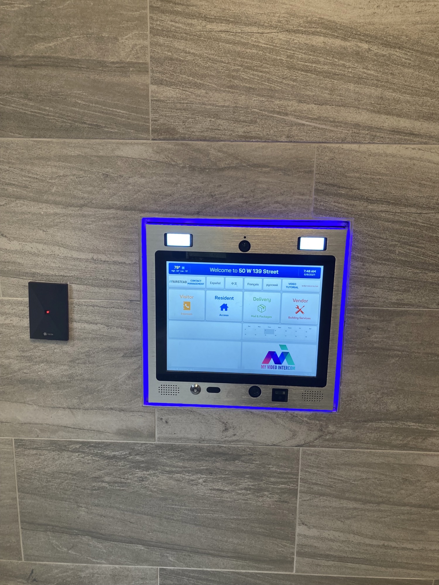 mvi keycom mounted on wood wall