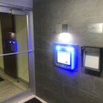 mvi keycom mounted on wall by office entrance