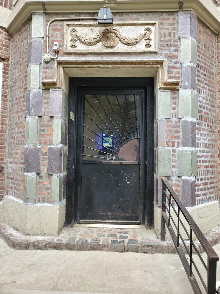 mvi keycom system mounted on wall inside of main stone building entrance