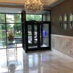 mvi keycom system mounted on wall by apartment building entrance