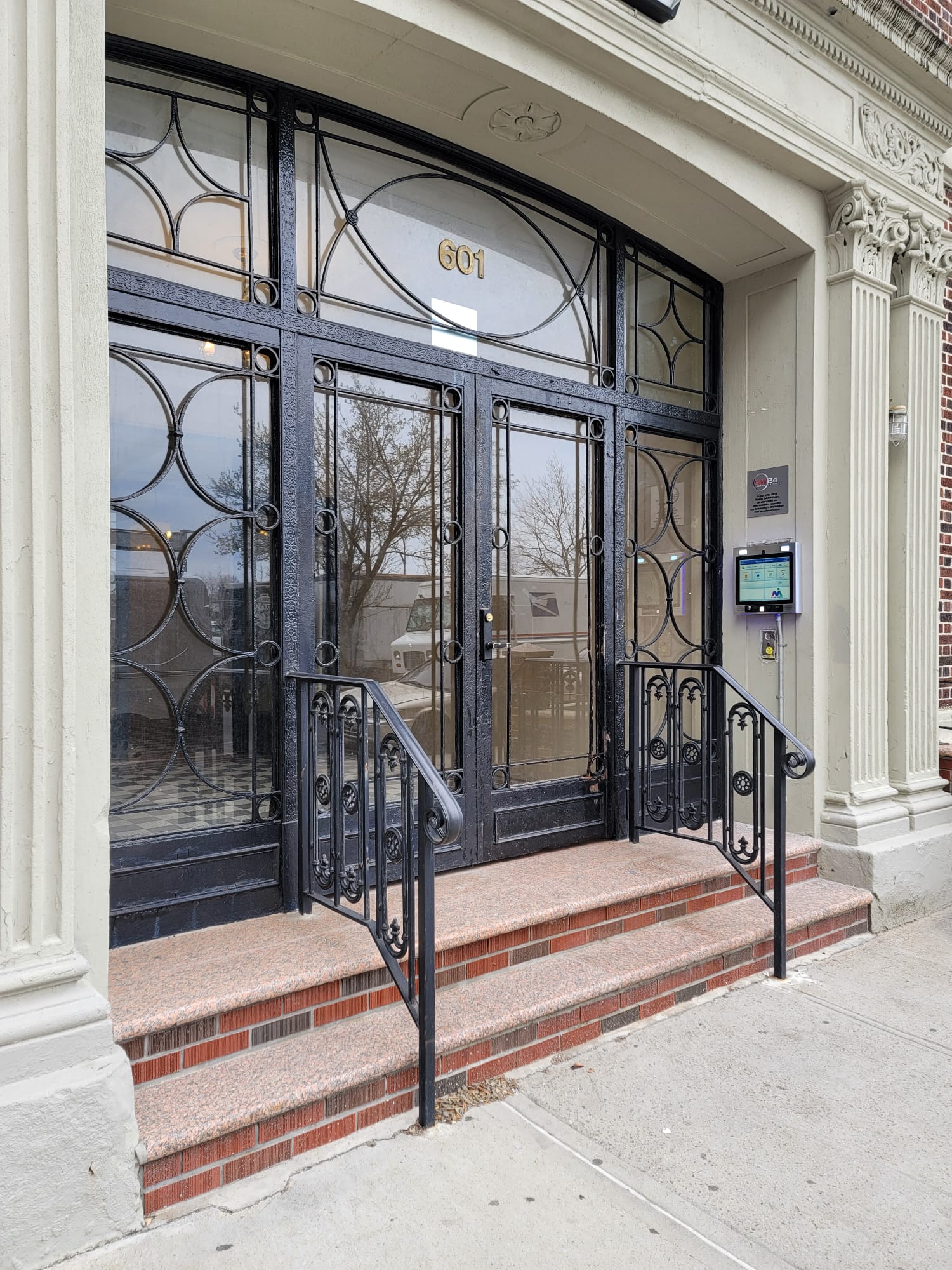 grand apartment entrance with keycom access system