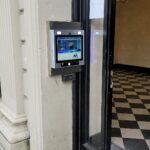 mvi video access system installed on white stone building